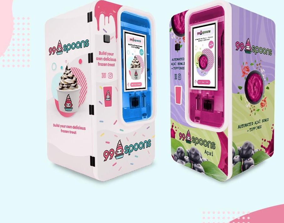 99 Spoons robotic soft-serve ice cream kiosks in pink and purple